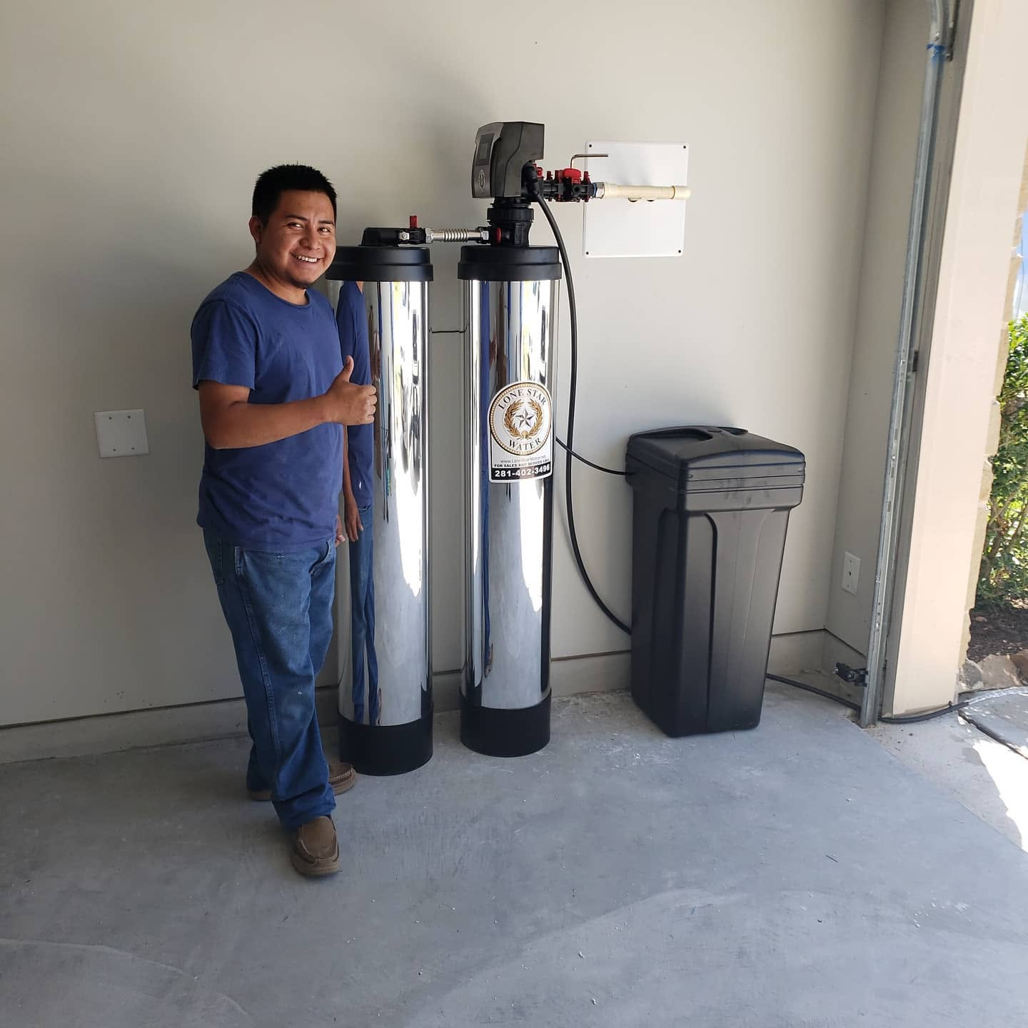 Lone Star Water filtration system installed in a utility room