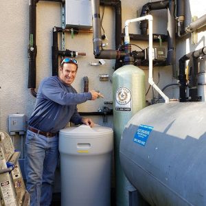 Lone Star staff installing custom commercial water treatment system.