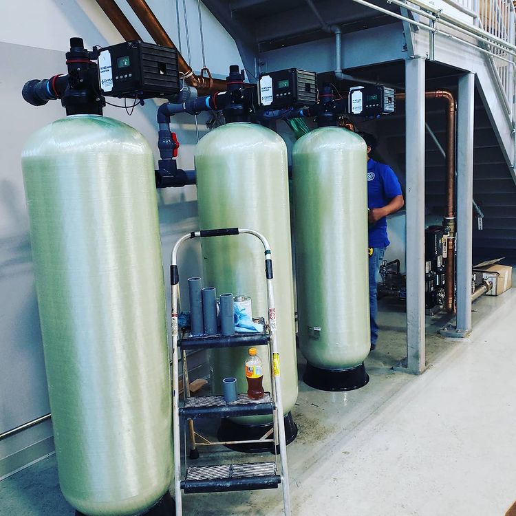 Close up images of three industrial water cleansing machines