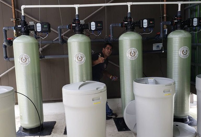 Commercial Water Softener and man