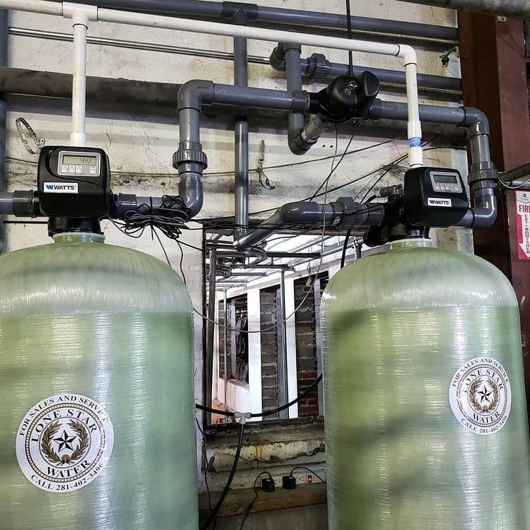 Commercial water filtration system with pipes.