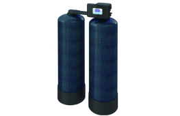 Dual-tank water softener system with digital control head.