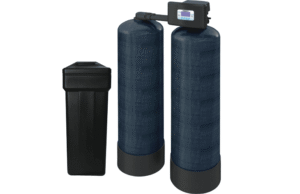 Water softener system with two blue tanks.