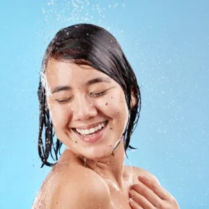 woman showering with soft water